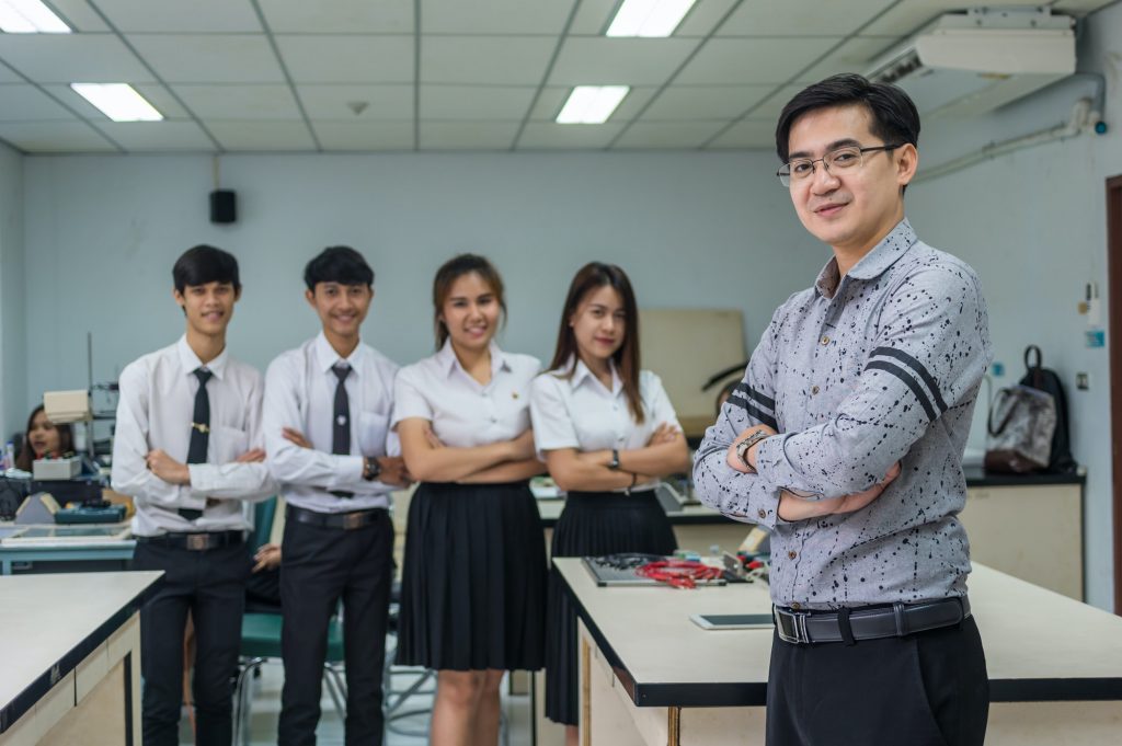 Portrait of Asian teacher and College Students in the laboratory classroom,